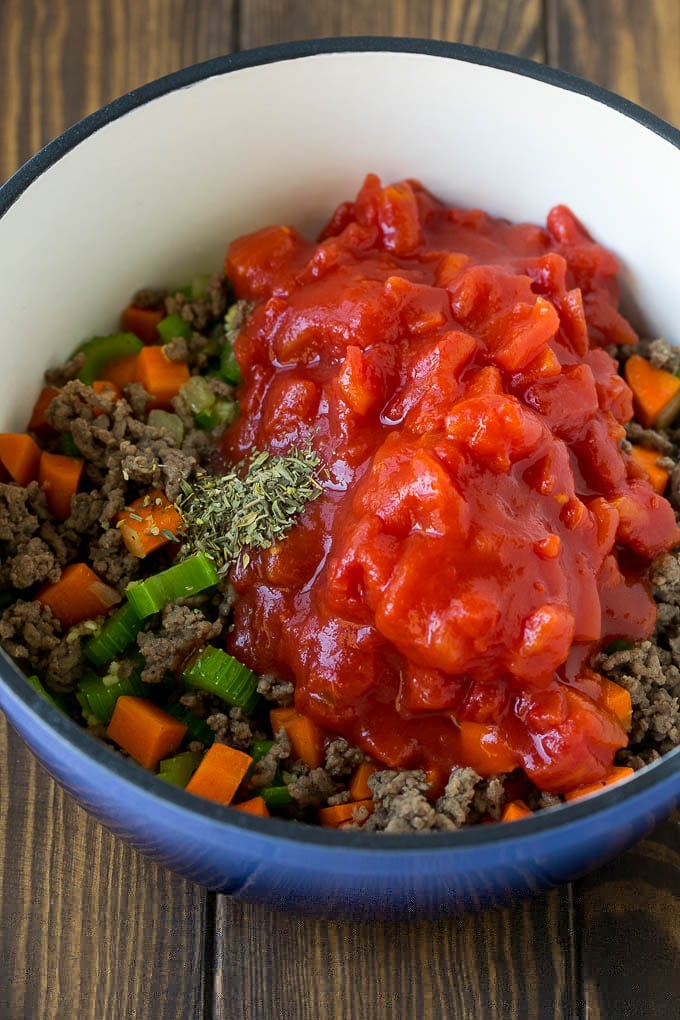 Alphabet Soup Recipe | Hamburger Soup | Beef and Vegetable Soup #soup #hamburger #noodles #dinner #ezlod #carrots Ground beef, vegetables, canned tomatoes and seasonings in a pot.