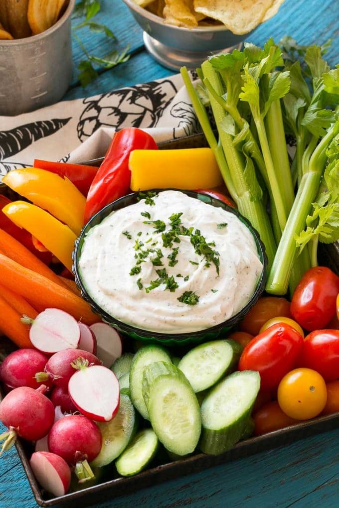 Homemade Ranch Dip Recipe | Homemade Ranch Powder | Homemade Ranch Dressing | Best Ranch Dip #ranch #dip #appetizer #snack #ezlod A bowl of homemade ranch dip surrounded by fresh vegetables.