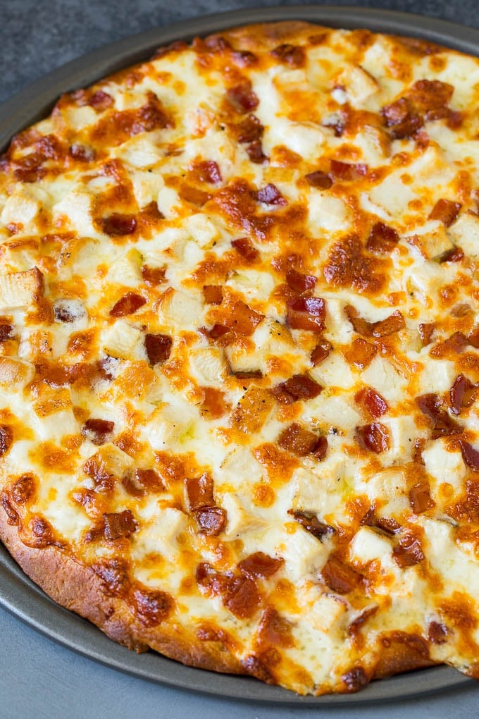 Chicken Alfredo Pizza Recipe #pizza #chicken #bacon #dinner #ezlod A baked crust topped with melted cheese and meat.