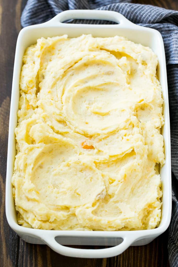 Loaded Mashed Potato Casserole Recipe | Loaded Potatoes | Bacon Mashed Potatoes | Thanksgiving Mashed Potatoes #potatoes #bacon #cheese #casserole #Thanksgiving #dinner #ezlod Mashed potatoes in a baking dish.
