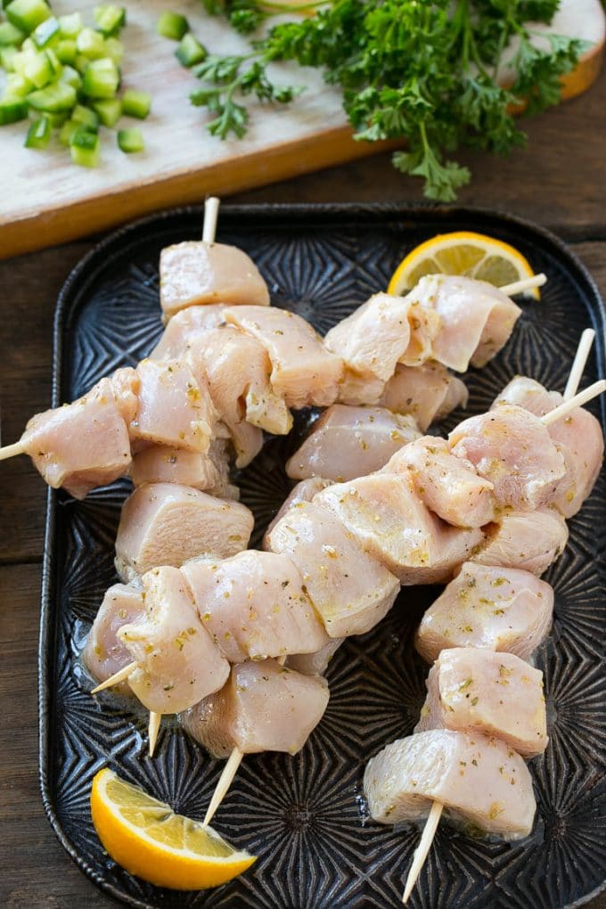 Greek Chicken Souvlaki Recipe | Easy Greek Chicken | Chicken Souvlaki | Greek Chicken Skewers | Easy Greek Chicken Skewers #chicken #kabobs #glutenfree #keto #lowcarb #grilling #ezlod Chunks of marinated chicken breast threaded onto skewers to be grilled.