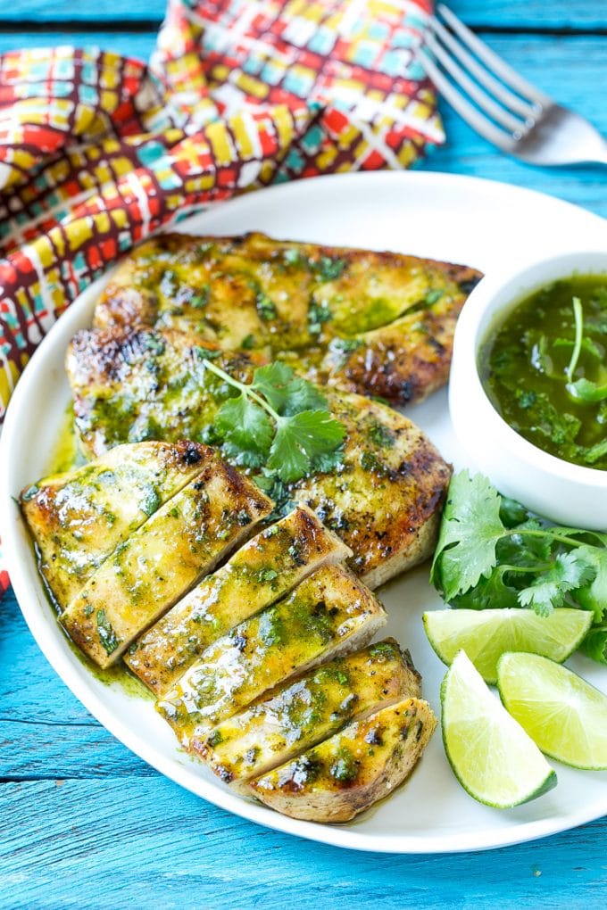 Cilantro Lime Chicken | Grilled Chicken #chicken #grilling #cilantro #lime #dinner #ezlod Sliced cilantro lime chicken on a serving plate.