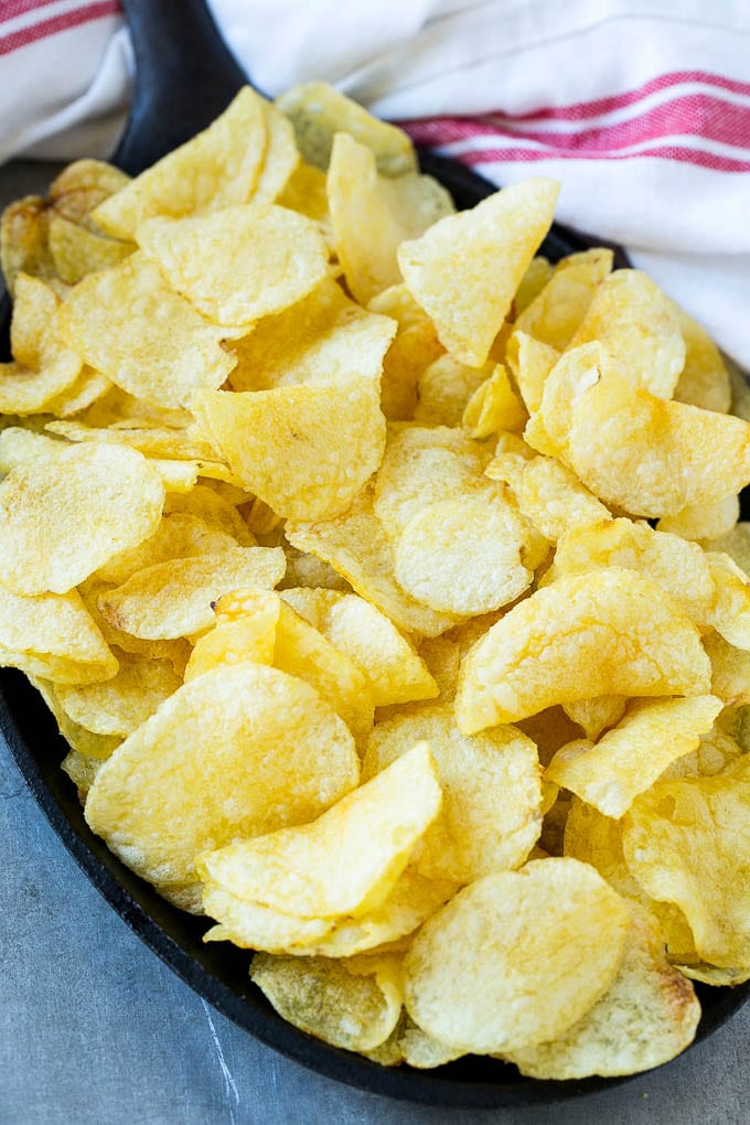 Irish Nachos Recipe | Potato Nachos | Potato Chip Recipe | Appetizer Recipe #nachos #potatoes #cheese #bacon #appetizer #ezlod Kettle chips in a skillet.