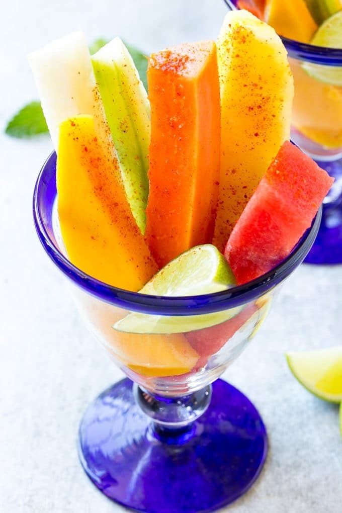 Mexican Fruit Cups | Fruit Cups | Mexican Fruit | Tropical Fruit #fruit #fruitcup #watermelon #pineapple #snack #healthy #ezlod Fruit cups filled with watermelon, cucumber, papaya and mango.