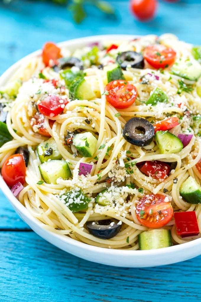 Spaghetti Salad Recipe | Pasta Salad | Potluck Recipe | Easy Pasta Salad #spaghetti #pasta #salad #ezlod A bowl of pasta salad with cucumbers, olives and parmesan cheese.
