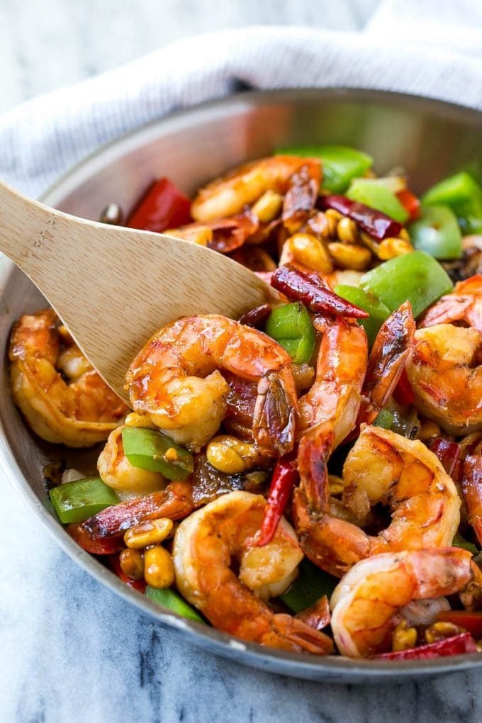 Kung Pao Shrimp | Shrimp Recipe | Shrimp Stir Fry | Easy Shrimp Recipe #shrimp #stirfry #peppers #dinner #ezlod #spicy A serving spatula in a pan of Kung Pao shrimp.