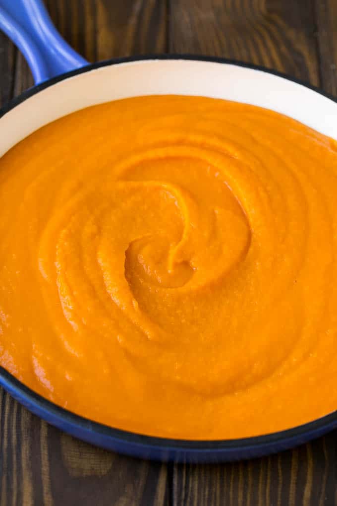 Butternut Squash Pasta Recipe #pasta #squash #bacon #fall #dinner #ezlod Creamy butternut squash sauce in a pan.