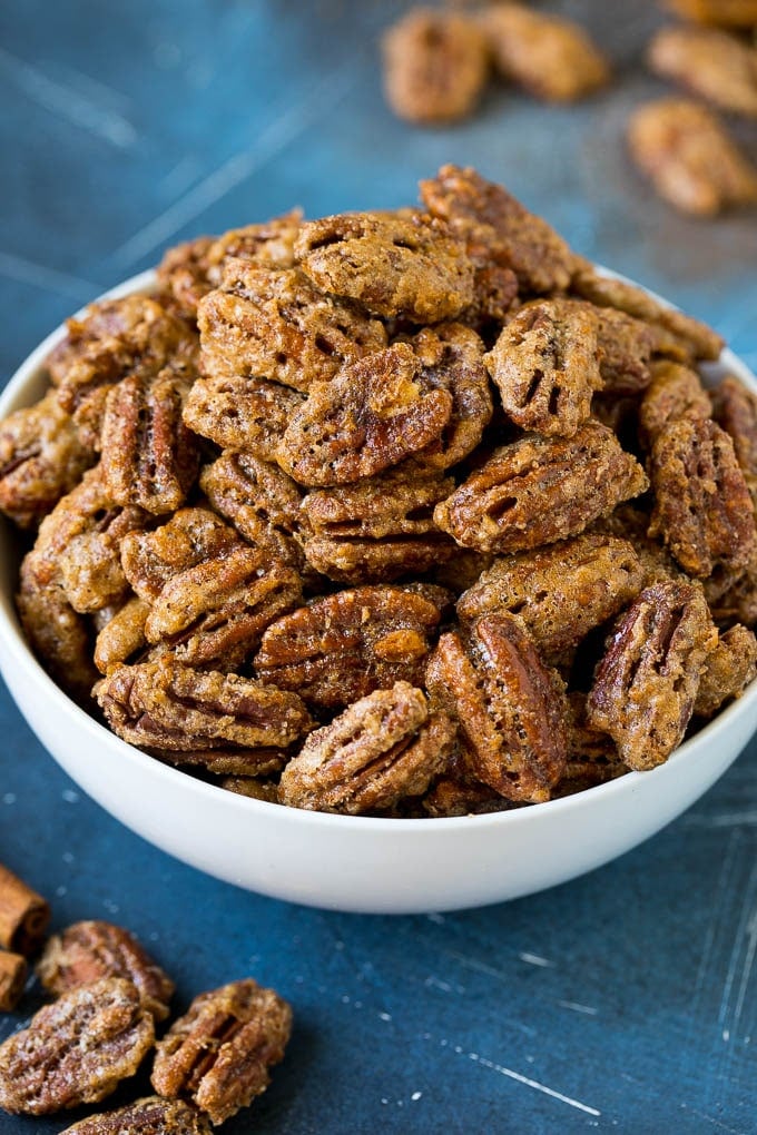 Candied Pecans Recipe | Glazed Pecans | Sugared Pecans #pecans #nuts #snack #dessert #ezlod A bowl filled with homemade candied pecans.