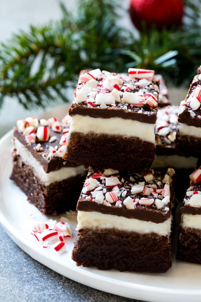 Peppermint Brownies Recipe | Holiday Brownies | Candy Cane Brownies | Mint Brownies #brownies #mint #peppermint #chocolate #dessert #christmas #ezlod These easy peppermint brownies on a plate are the perfect holiday treat.