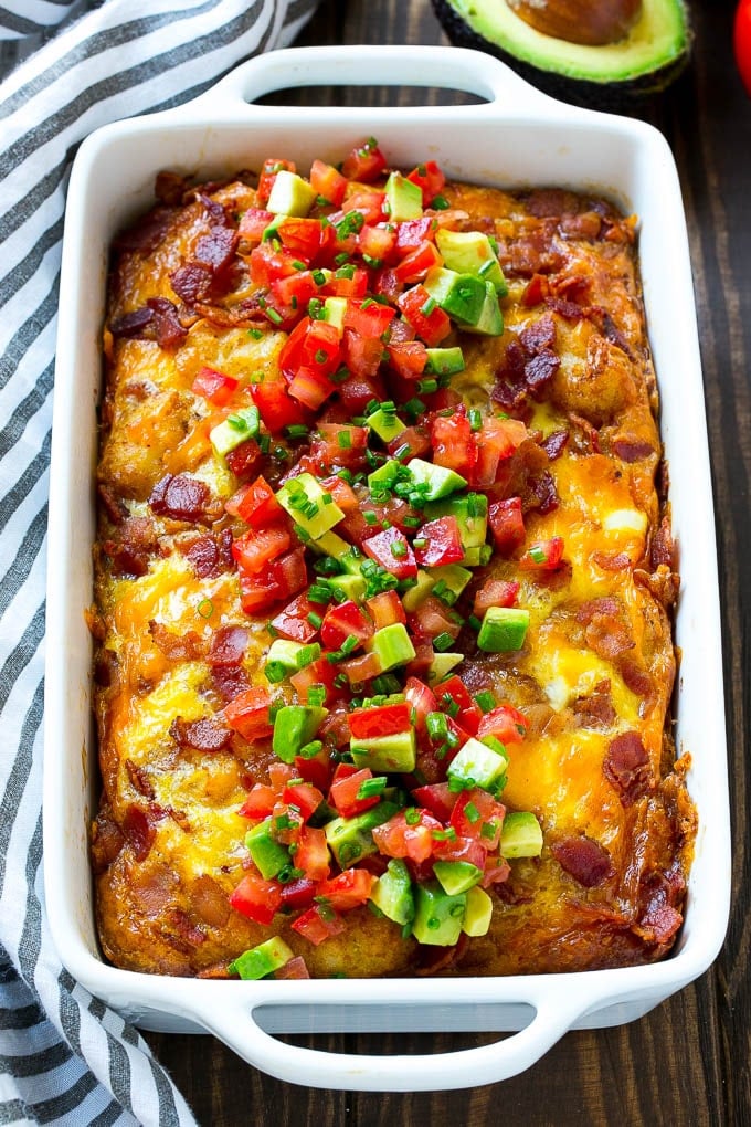 Breakfast Casserole with Bacon Recipe | Bacon and Egg Casserole | Egg Casserole with Bacon | Bacon Breakfast Casserole #eggs #bacon #casserole #breakfast #brunch #ezlod A breakfast casserole with bacon that is topped with avocado and tomato.