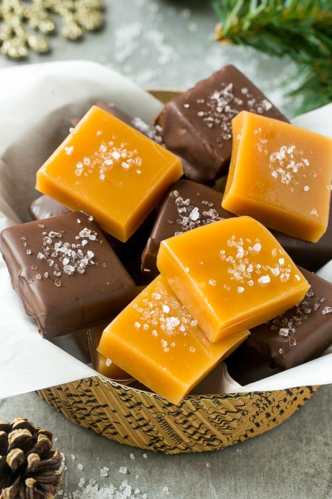 Microwave Caramels with Sea Salt Recipe | Homemade Caramels | Sea Salt Caramel | Homemade Candy #candy #caramels #caramel #microwavecaramels #homemade #dessert #ezlod A basket of microwave caramels topped with sea salt.