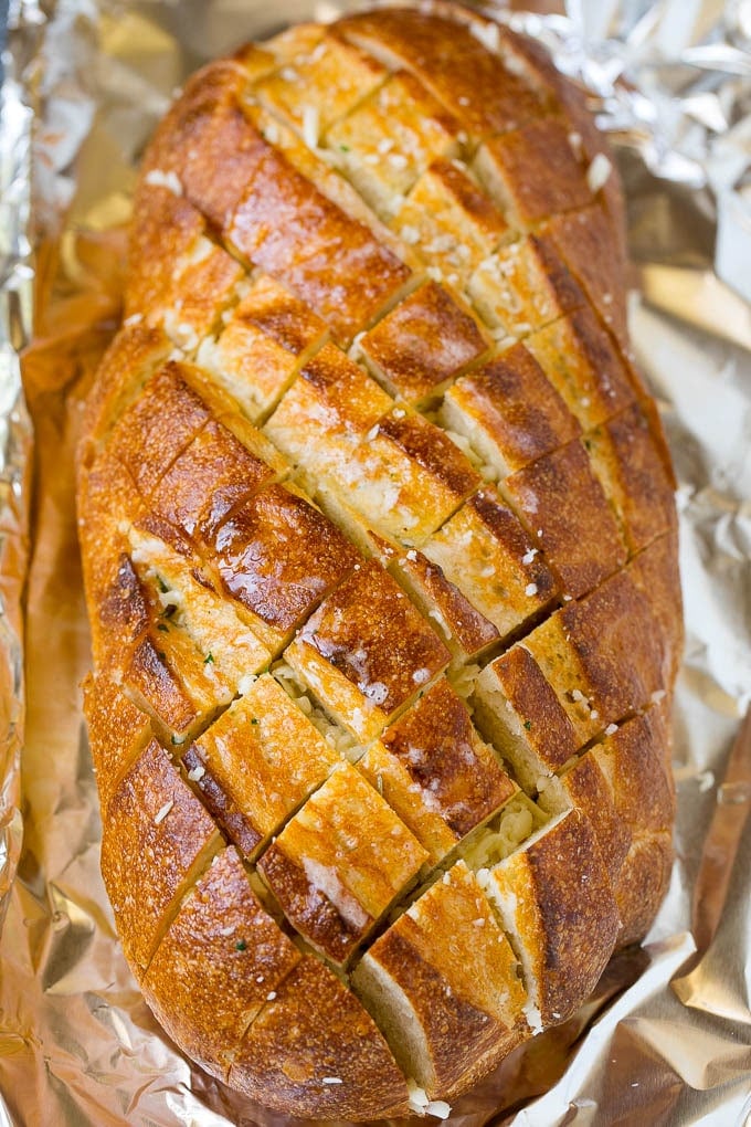 Pull Apart Bread | Garlic Bread | Cheese Bread #bread #garlic #cheese #sidedish #appetizer #ezlod Garlic butter and shredded cheese stuffed into a cut loaf of bread.