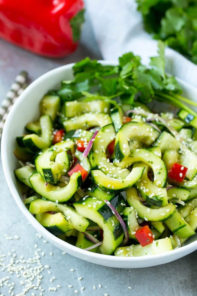 Asian Cucumber Salad Recipe | Sesame Cucumber Salad | Cucumber Salad | Healthy Salad | Healthy Cucumber Recipe #cucumber #cucumbersalad #salad #sidedish #ezlod This recipe for Asian cucumber salad is cucumbers and colorful veggies tossed in a zesty sesame dressing. The perfect quick and easy side dish!