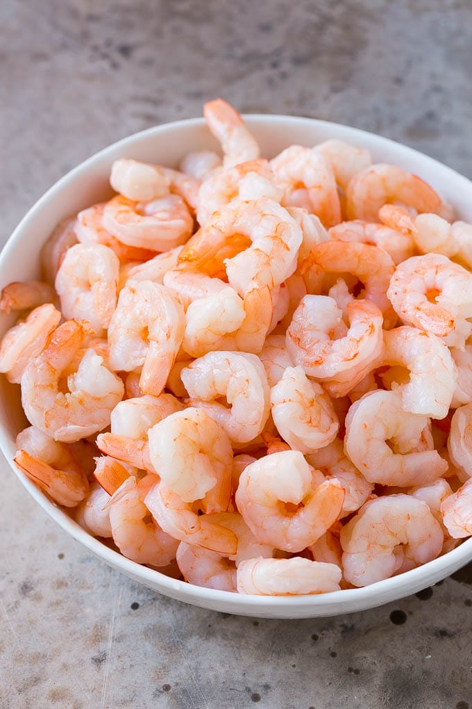 Shrimp Ceviche Recipe | Mexican Shrimp | Marinated Shrimp #shrimp #ceviche #cleaneating #healthy #lowcarb #keto #glutenfree #dinner #appetizer #ezlod Cooked prawns in a serving bowl.