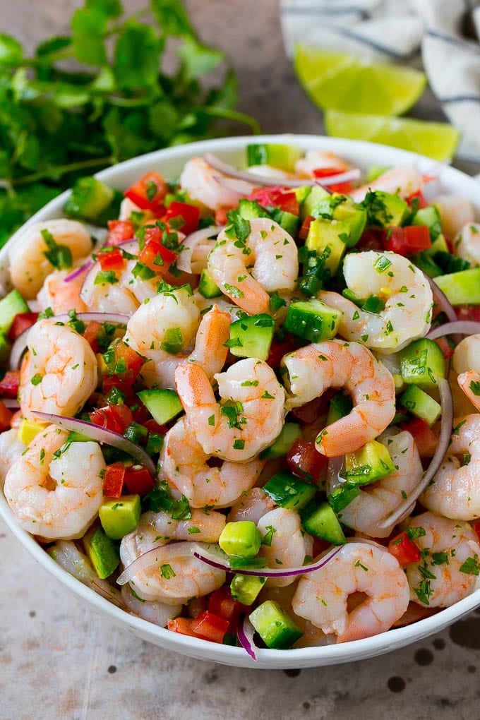 Shrimp Ceviche Recipe | Mexican Shrimp | Marinated Shrimp #shrimp #ceviche #cleaneating #healthy #lowcarb #keto #glutenfree #dinner #appetizer #ezlod A bowl of shrimp ceviche marinated in citrus juice with tomato, avocado, cilantro and jalapeno.