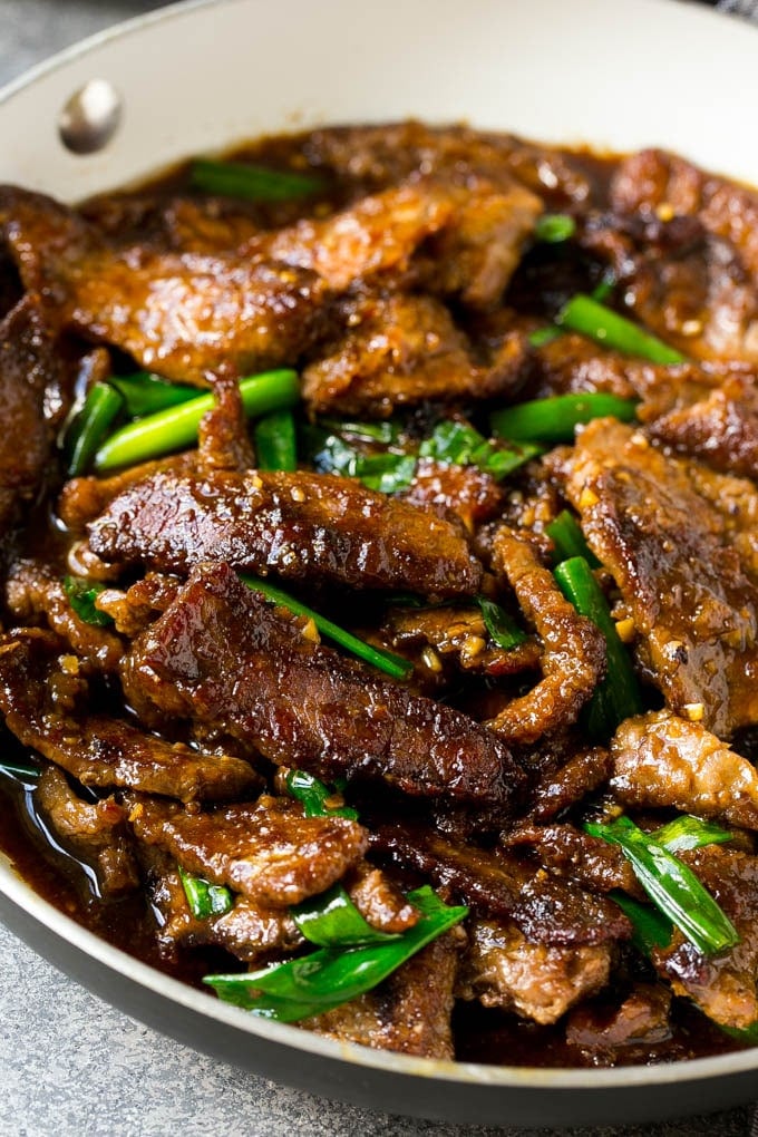 Mongolian Beef Recipe | Asian Beef Recipe | Chinese Beef | Beef Stir Fry #Chinese #Mongolian #Asian #mongolianbeef #beef #ezlod #dinner A pan full of Mongolian beef with green onions.