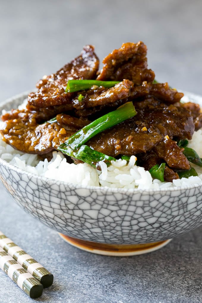 Mongolian Beef Recipe | Asian Beef Recipe | Chinese Beef | Beef Stir Fry #Chinese #Mongolian #Asian #mongolianbeef #beef #ezlod #dinner A bowl of mongolian beef over rice.