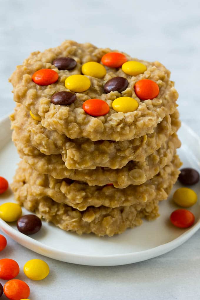 No Bake Peanut Butter Cookies Recipe | No Bake Cookies | Peanut Butter Cookies #peanutbutter #cookies #nobake #nobakecookies #peanutbuttercookies #dessert #ezlod A plate with a stack of no bake peanut butter cookies.