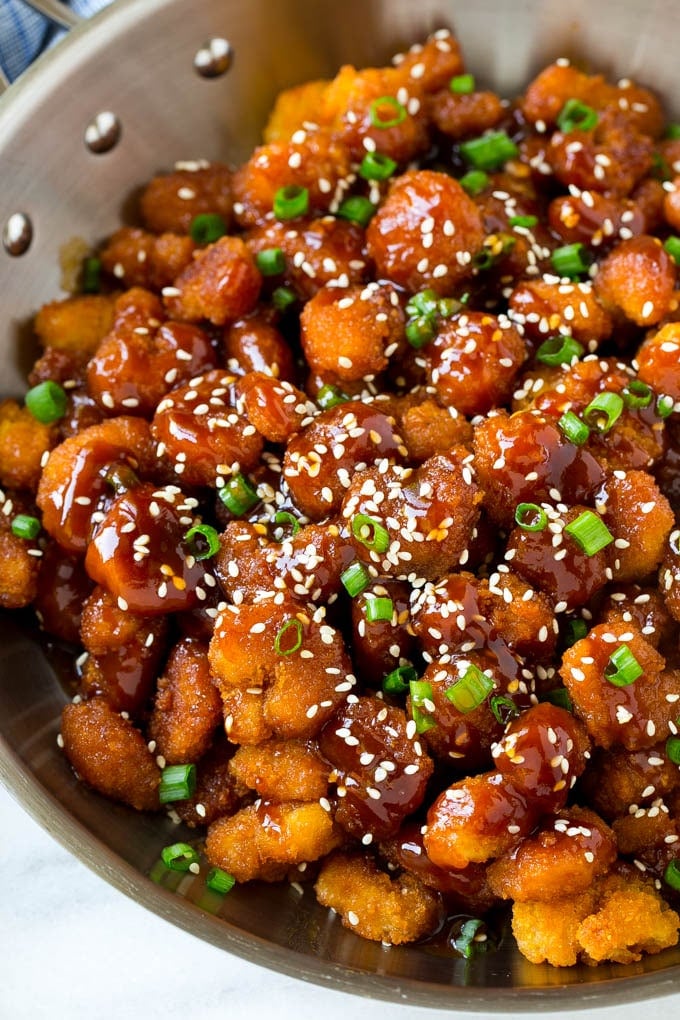 Sesame Shrimp Recipe | Crispy Shrimp | Popcorn Shrimp | Asian Shrimp | Easy Shrimp Recipe #shrimp #fried #friedshrimp #sesameshrimp #crispy #popcornshrimp #chinese #asian #dinner #ezlod A pan of popcorn shrimp in an Asian sesame sauce.