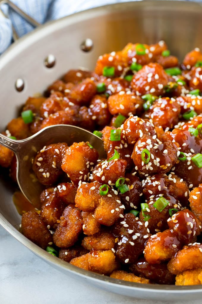 Sesame Shrimp Recipe | Crispy Shrimp | Popcorn Shrimp | Asian Shrimp | Easy Shrimp Recipe #shrimp #fried #friedshrimp #sesameshrimp #crispy #popcornshrimp #chinese #asian #dinner #ezlod A pan of crispy sesame shrimp tossed in an Asian style sauce.