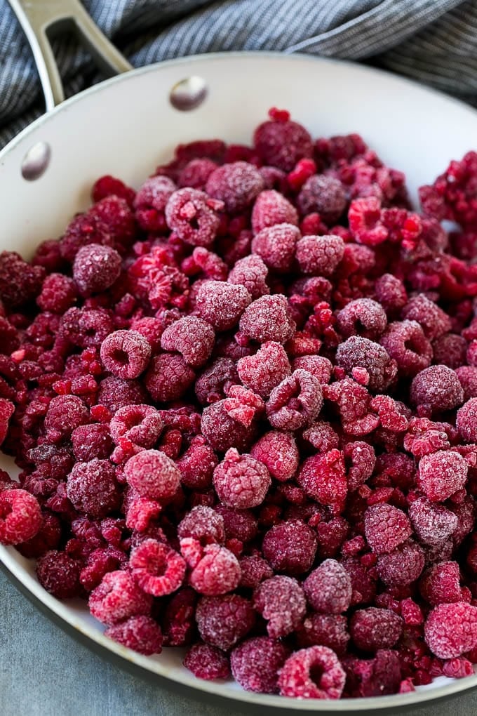 Raspberry Sauce Recipe | Homemade Raspberry Sauce | Raspberry Recipe #raspberries #dessert #ezlod A pan of frozen berries.