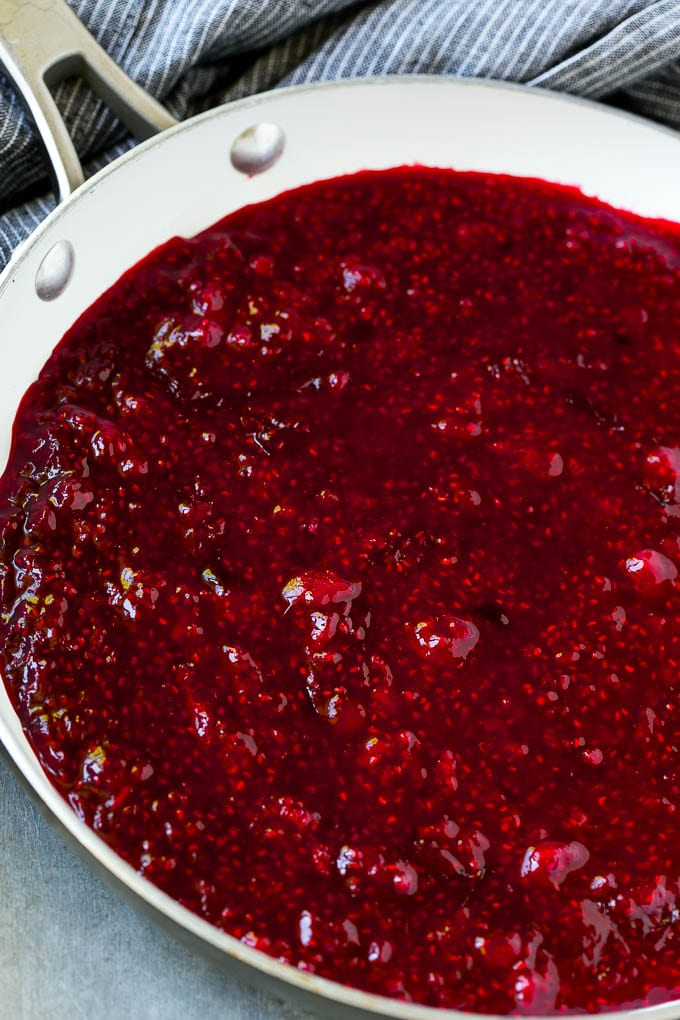 Raspberry Sauce Recipe | Homemade Raspberry Sauce | Raspberry Recipe #raspberries #dessert #ezlod Berries cooked in a skillet.