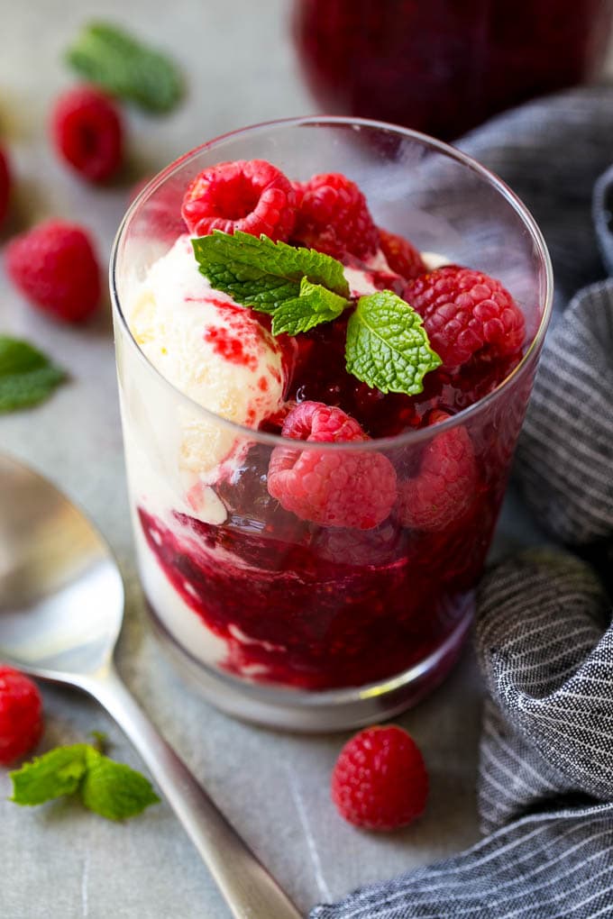Raspberry Sauce Recipe | Homemade Raspberry Sauce | Raspberry Recipe #raspberries #dessert #ezlod A cup of vanilla ice cream with raspberry sauce and fresh raspberries.