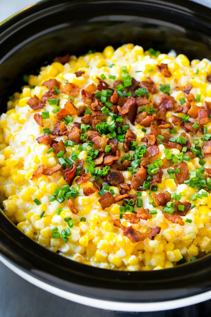 Slow Cooker Creamed Corn Recipe | Easy Creamed Corn Recipe | Slow Cooker Creamed Corn with Bacon | Southern Creamed Corn | Creamed Corn with Cream Cheese #creamedcorn #corn #bacon #crockpot #slowcooker #dinner #ezlod Slow cooker creamed corn with Bacon and sliced chives.