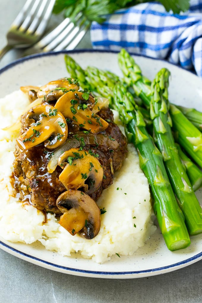 Slow Cooker Salisbury Steak Recipe | Homemade Salisbury Steak | Salisbury Steak from Scratch #steak #beef #salisbury #salisburysteak #slowcooker #crockpot #dinner #ezlod Slow cooker salisbury steak with mushroom gravy over mashed potatoes.
