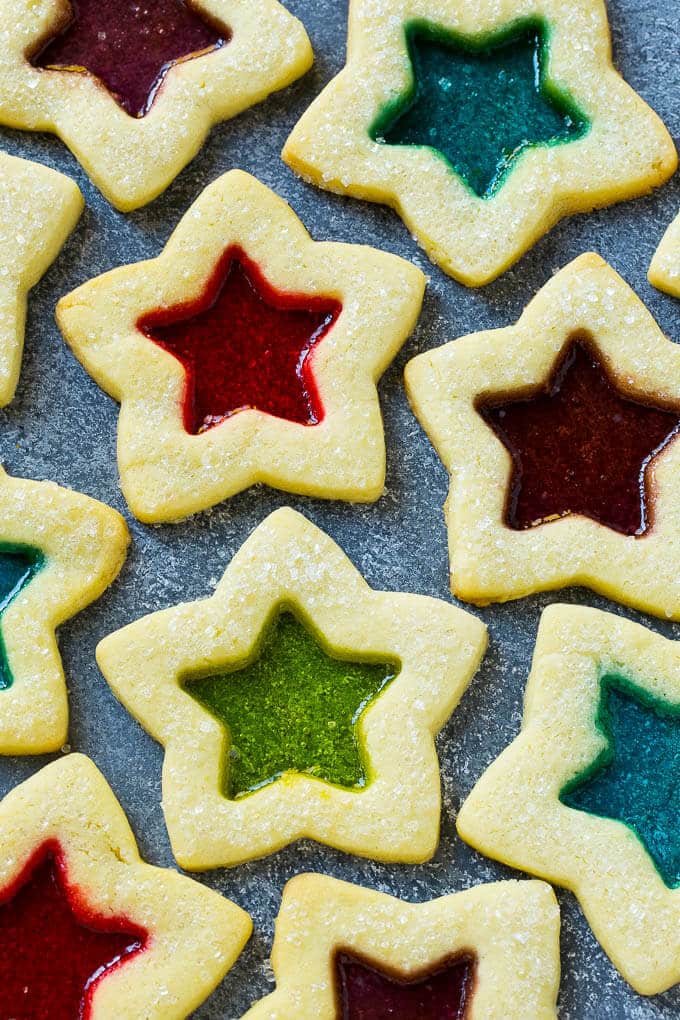 Stained Glass Cookies | Stained Glass Window Cookies | Christmas Cookies | Sugar Cookies | Holiday Cookies #cookies #stainedglasscookies #sugarcookies #christmascookies #christmas #holiday #dessert #ezlod Stained glass window cookies in various colors.