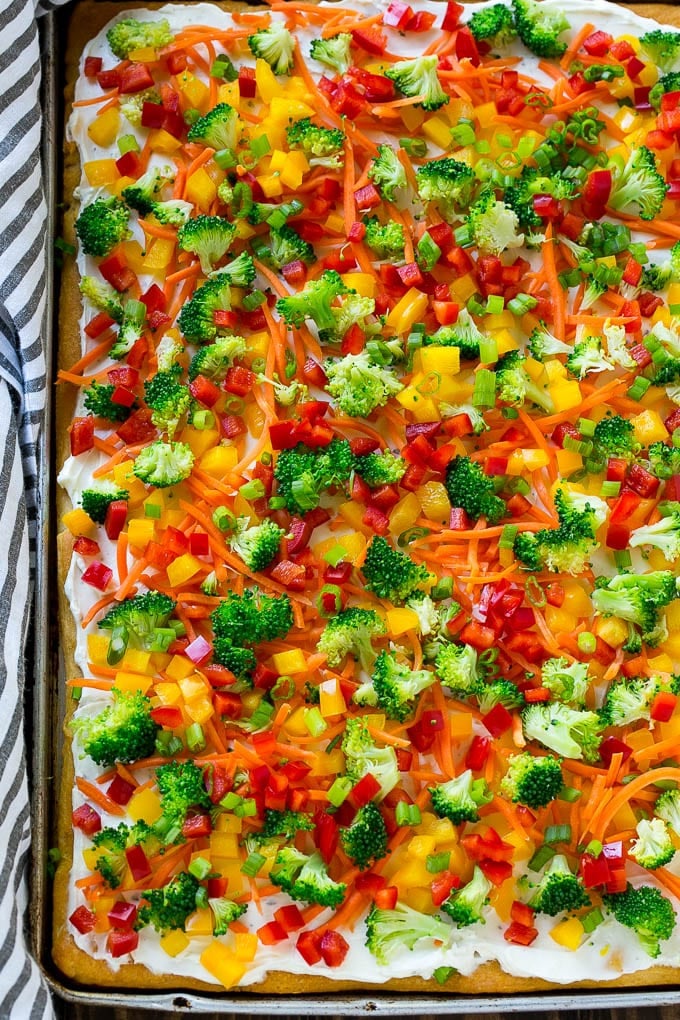Veggie Pizza Recipe | Crescent Veggie Pizza | Vegetable Pizza Recipe | Holiday Appetizer | Homemade Veggie Pizza #pizza #veggies #vegetarian #appetizer #ezlod A sheet pan of crescent veggie pizza.