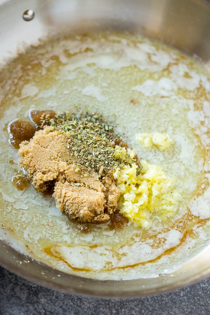 Brown Sugar Pork Chops Recipe | Bone In Pork Chops Recipe | Garlic Butter Pork Chops | Skillet Pork Chops #pork #porkchops #garlic #dinner #glutenfree #ezlod Melted butter, brown sugar, herbs and garlic form the sauce for pork chops.