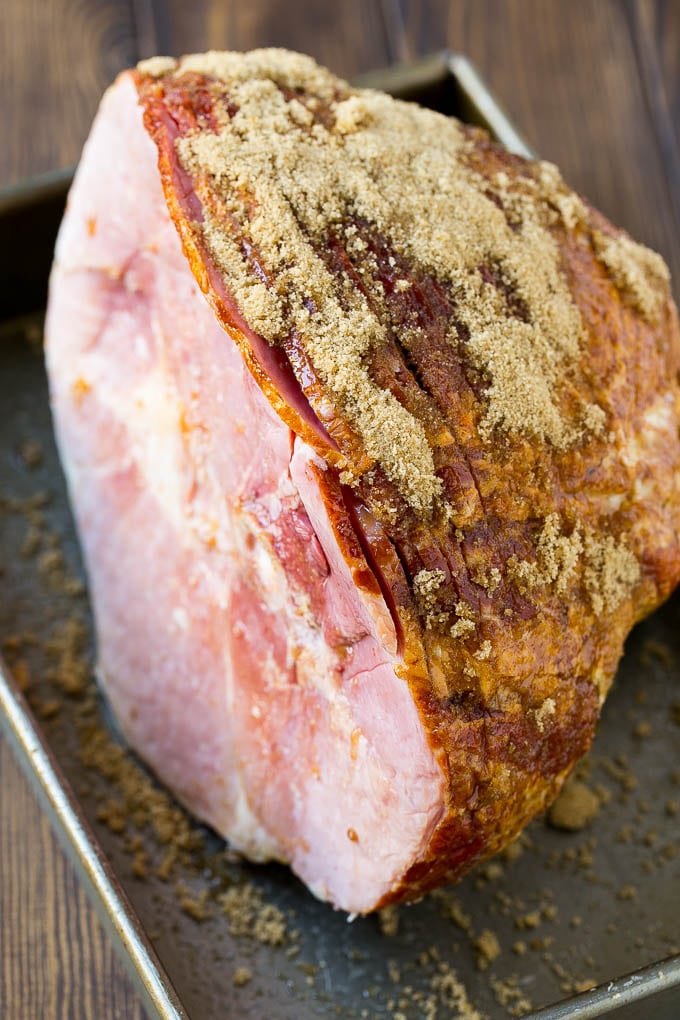 Coca Cola Ham | Coke Glazed Ham | Easter Ham | Christmas Ham | Holiday Ham Recipe #ham #easter #christmas #dinner #ezlod A spiral glazed ham coated in brown sugar.