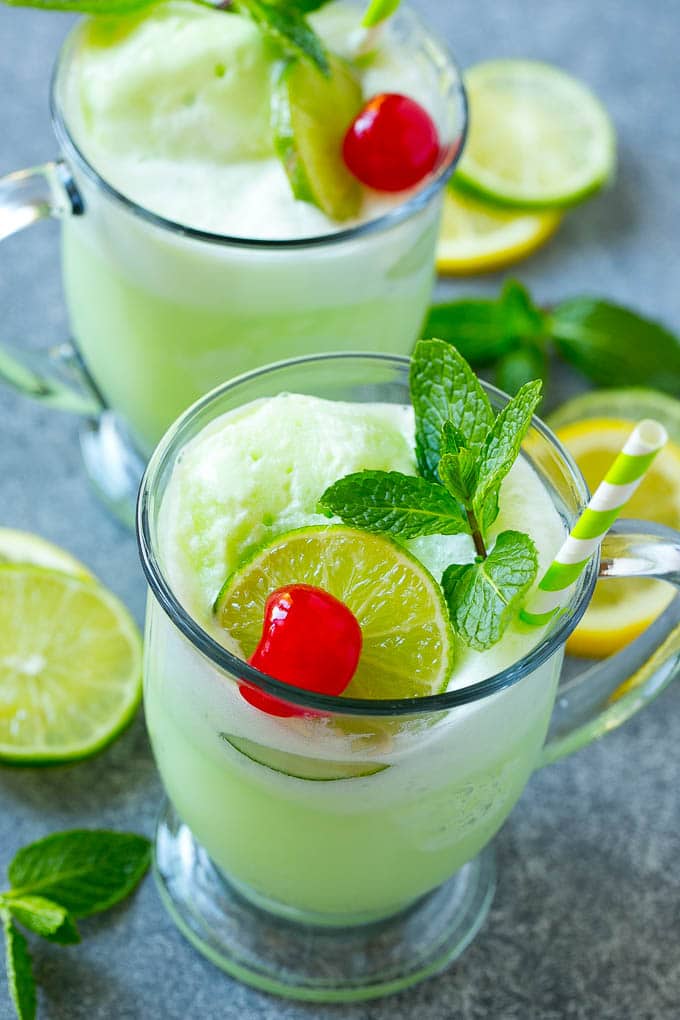 Lime Sherbet Punch | Party Punch Recipe | Sherbet Punch Recipe | Limeade Recipe #sherbet #punch #lime #drink #ezlod Cups of sherbet punch with straws.