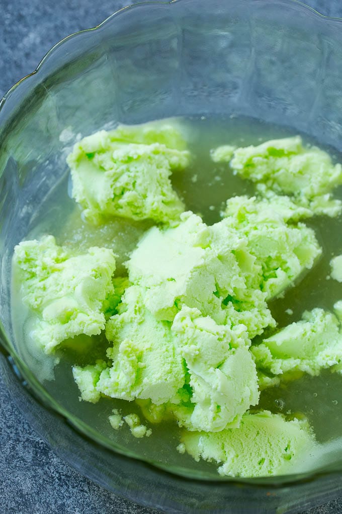 Lime Sherbet Punch | Party Punch Recipe | Sherbet Punch Recipe | Limeade Recipe #sherbet #punch #lime #drink #ezlod A bowl with limeade concentrate and sherbet in it.