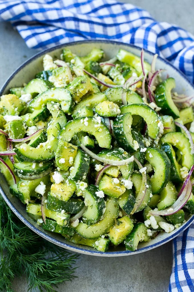 Cucumber Feta Salad Recipe | Cucumber Salad | Feta Cheese Salad | Summer Salad #salad #cucumber #ezlod A bowl of cucumber feta salad with avocado.