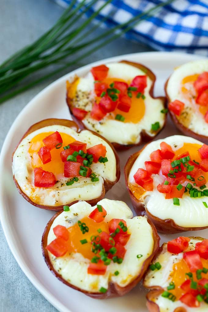 Ham and Egg Cups Recipe | Low Carb Breakfast | Ham and Eggs #ham #eggs #lowcarb #breakfast #ezlod A plate of ham cups filled with eggs and cheese.