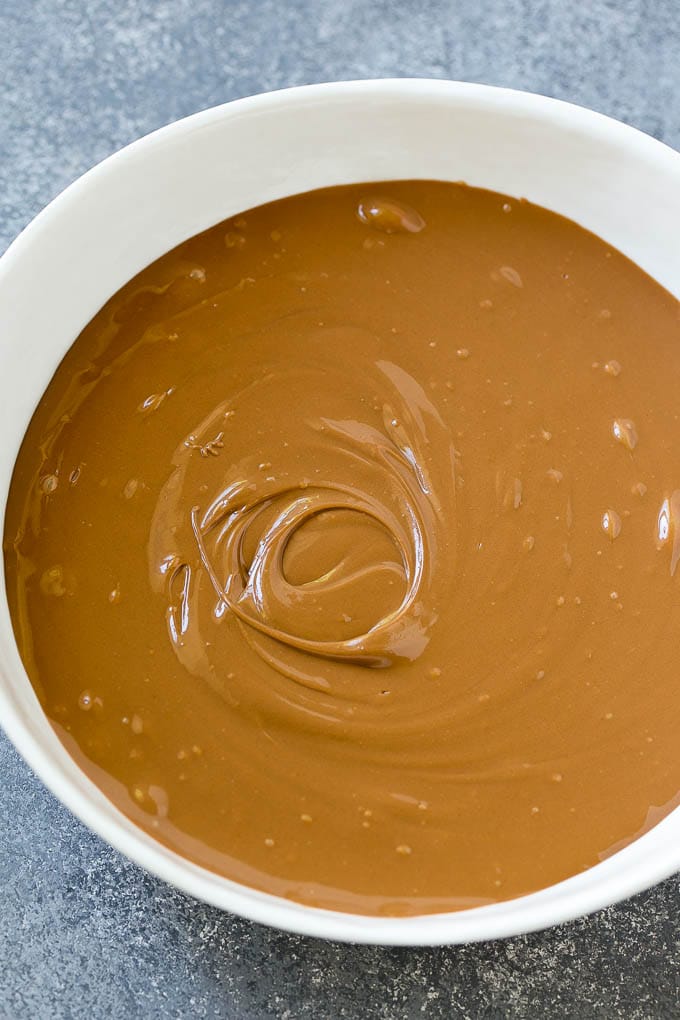 Haystack Cookies Recipe | No Bake Cookies | Chow Mein Noodle Cookies #nobakecookies #cookies #recipe #chocolate #ezlod A bowl of melted milk chocolate chips and butterscotch chips.
