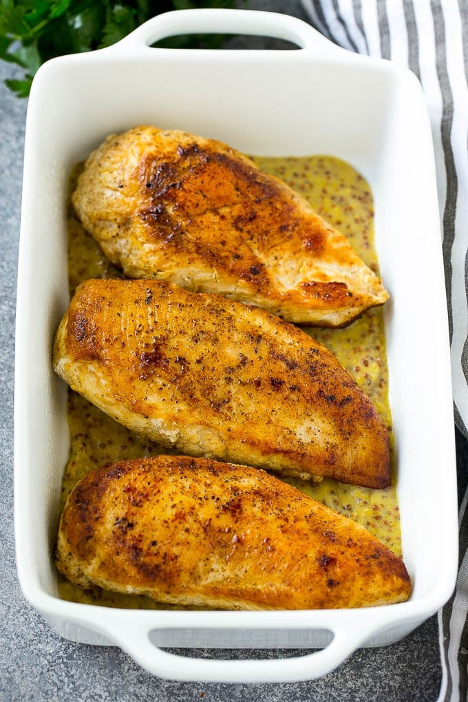 Honey Mustard Chicken Recipe | Baked Chicken Recipe | Easy Chicken Recipe #chicken #dinner #ezlod Seared chicken breasts in a baking dish.