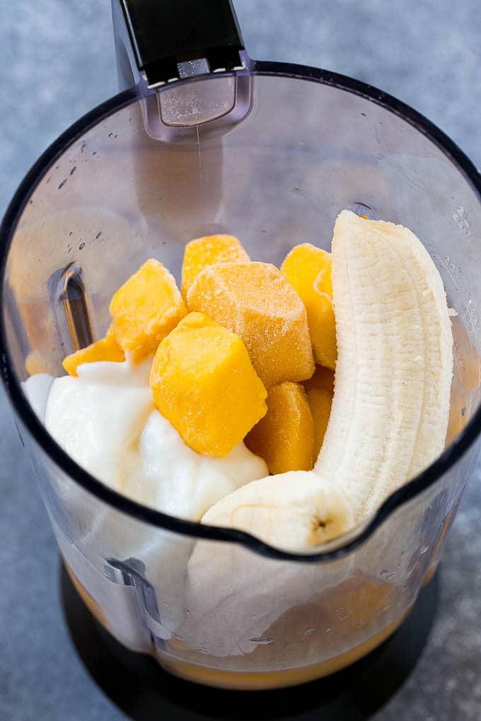 Mango Smoothie Recipe | Mango Recipe | Healthy Smoothie #mango #smoothie #drink #ezlod Fruit, yogurt and juice in a blender.