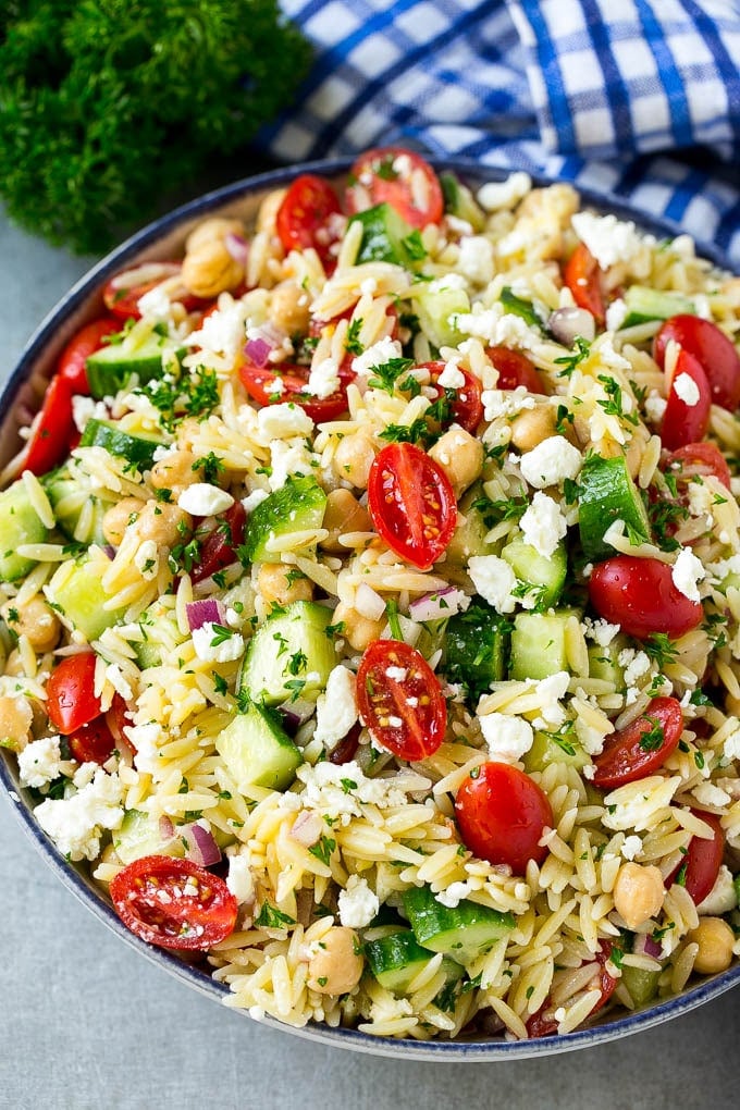 Orzo Salad Recipe | Orzo Pasta Salad | Greek Orzo Salad | Mediterranean Orzo Salad #pastasalad #orzo #greekfood #salad #ezlod Greek orzo salad with pasta, cucumbers, tomatoes and feta cheese.