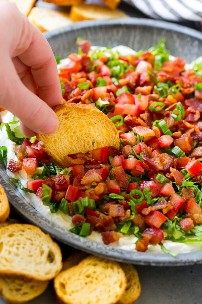 BLT Dip Recipe | Bacon Dip Recipe | Ranch Dip #dip #ranch #bacon #lettuce #tomato #appetizer #ezlod BLT dip with bacon, lettuce, tomato and green onions over a creamy ranch dip.
