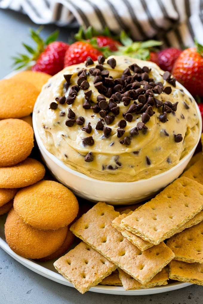Cookie Dough Dip Recipe | Edible Cookie Dough | Chocolate Chip Cookie Dip #cookies #dip #cookiedough #dessert #snack #ezlod Chocolate chip cookie dough dip, topped with mini chocolate chips and served with graham crackers and vanilla wafers.
