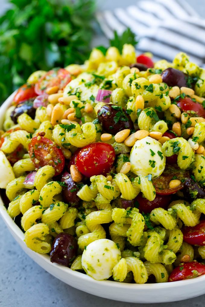 Pesto Pasta Salad | Italian Pasta Salad | Easy Pasta Salad #pasta #salad #pesto #olives #tomatoes #ezlod Pesto pasta salad with tomatoes, olive and fresh mozzarella.
