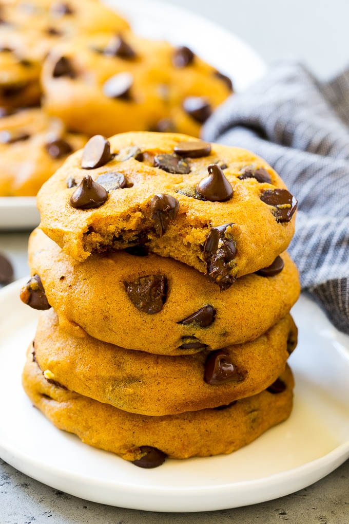 Pumpkin Chocolate Chip Cookies Recipe | Pumpkin Cookies | Pumpkin Chocolate Cookies #pumpkin #cookies #chocolate #baking #fall #ezlod #dessert A stack of pumpkin chocolate chip cookies.