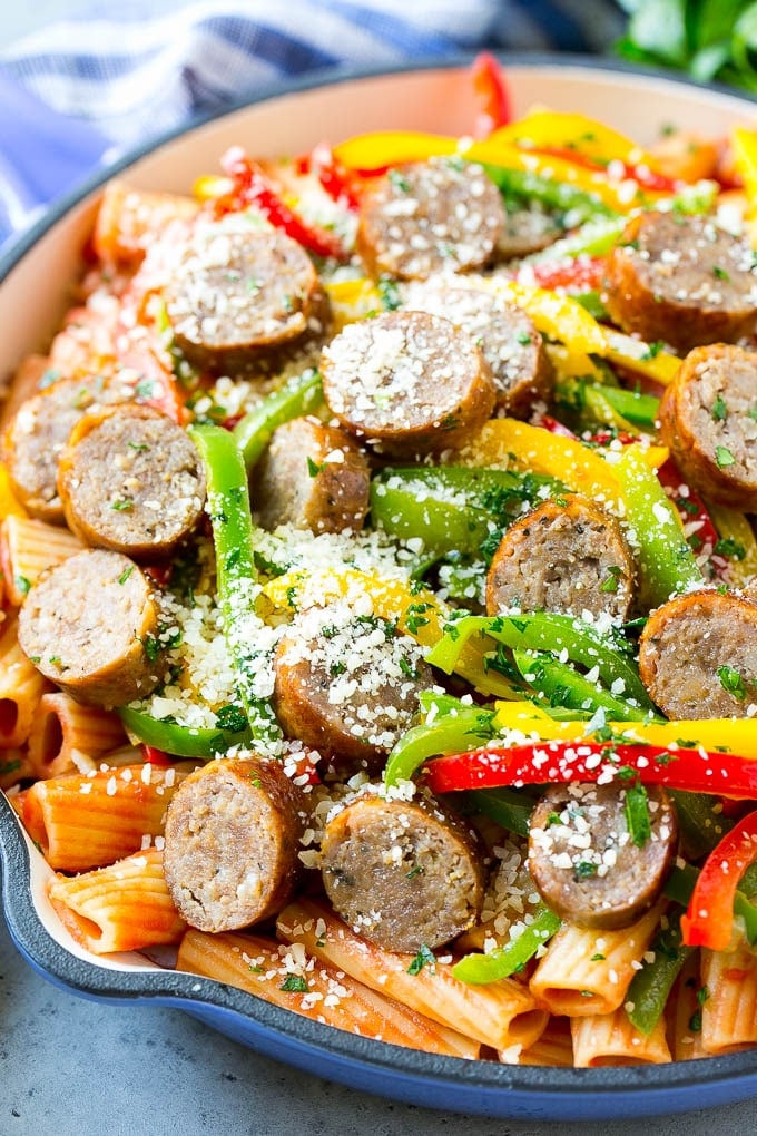 Sausage and Pepper Pasta Recipe | Italian Sausage Recipe | Sausage and Peppers | Easy Pasta #pasta #sausage #peppers #dinner #ezlod Sausage and pepper pasta with sliced Italian sausage, red and yellow bell peppers and grated parmesan cheese.