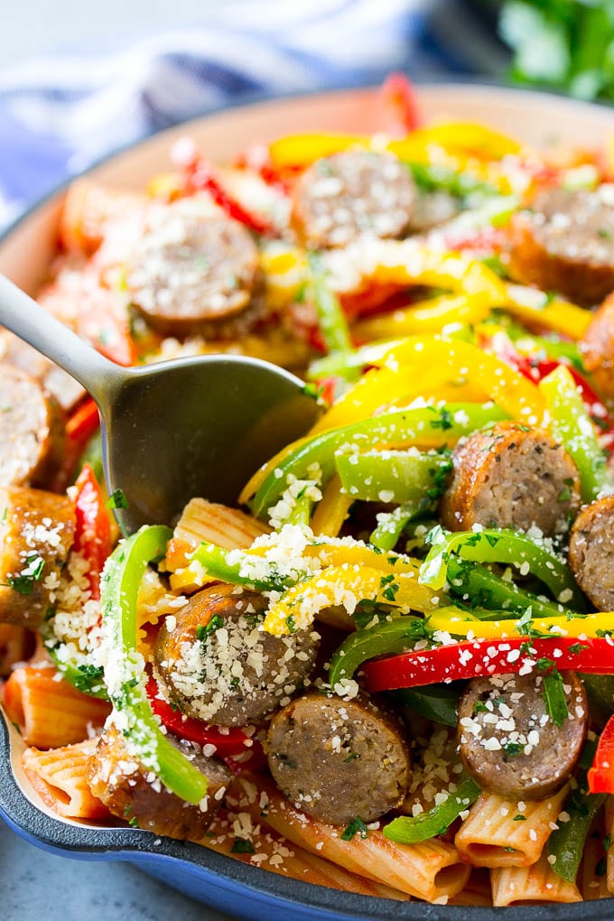 Sausage and Pepper Pasta Recipe | Italian Sausage Recipe | Sausage and Peppers | Easy Pasta #pasta #sausage #peppers #dinner #ezlod Sausage and pepper pasta with Italian sausage, topped with parmesan cheese.