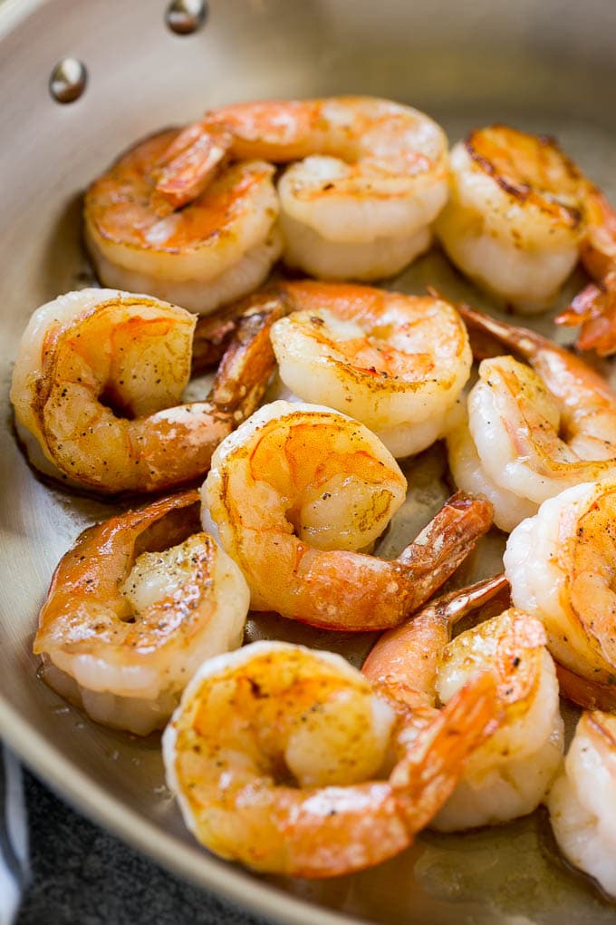 Shrimp Alfredo Recipe | Shrimp Alfredo Pasta | Shrimp Fettuccine Alfredo #shrimp #pasta #italianfood #ezlod Seared shrimp in butter, in a skillet.
