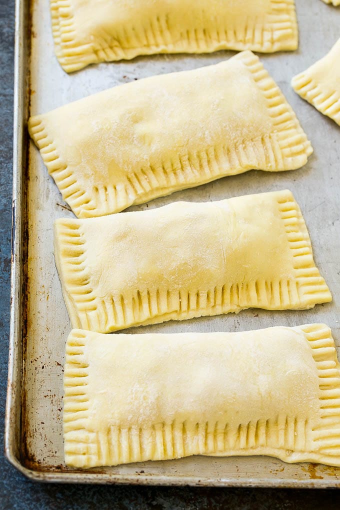 Fried Apple Pies Recipe | McDonald's Copycat Recipe | Apple Pie | Apple Hand Pies #pie #apples #applepie #dessert #snack #ezlod Puff pastry apple hand pies ready to go into the fryer.