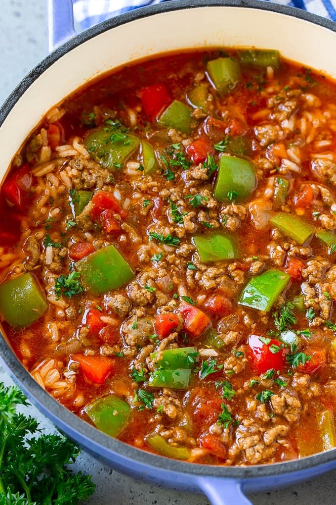 Stuffed Pepper Soup Recipe | Beef and Rice Soup | Stuffed Peppers #peppers #soup #beef #rice #dinner #ezlod A pot of stuffed pepper soup with rice, ground beef, tomatoes, onions and bell peppers.